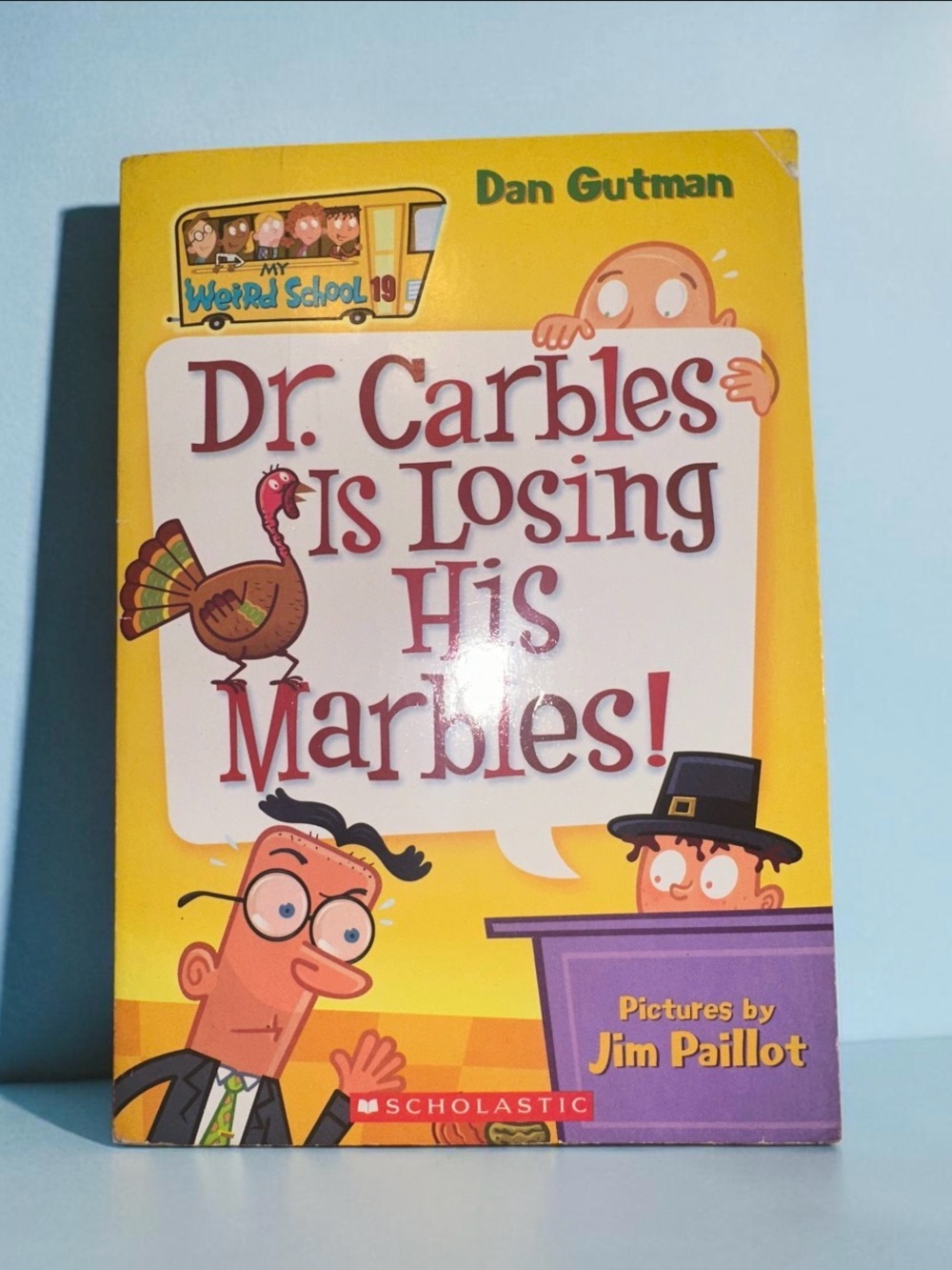 Scholastic "Dr. Carbles Is Losing His Marbles!" By Dan Gutman.